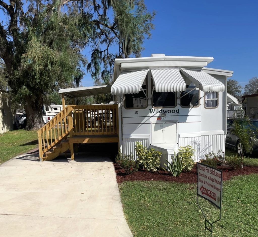 Preowned cottage for sale at Sunshine Village in Central Florida near The Villages