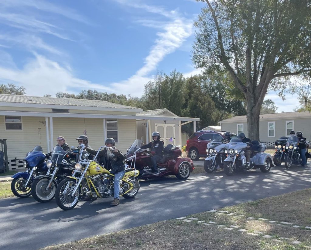 Gathering for a daily motorcycle ride at Sunshine Village MH & RV in Webster.